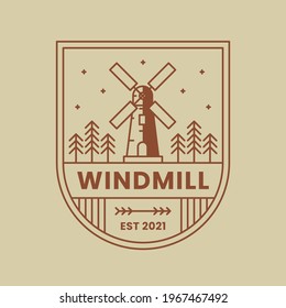 Windmill or windturbine logo with trees