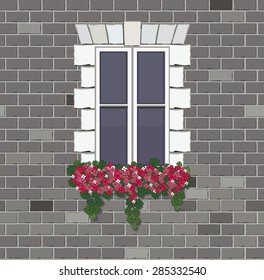 Window with flower on brick wall background. Vintage French wall with window.