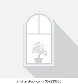 Window and a pot of flowers.