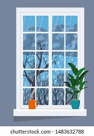 Window With Rainy City View. On The Windowsill Is A Flower With A Hot Drink.