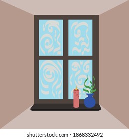 
window in a room with patterns of frost