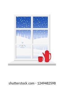 Window with window sill and white frame overlooking the snowy winter landscape. On the windowsill is a coffee pot and a cup of drink.