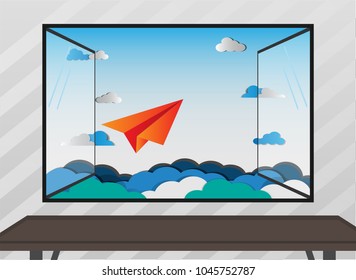 Window view paper plane flying on blue sky with fluffy clouds vector illustrations. orange paper airplane go to the destination with empty desk table copy space. start up business freedom concept.