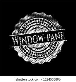 Window-pane chalk emblem written on a blackboard