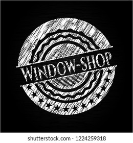 Window-shop chalkboard emblem written on a blackboard