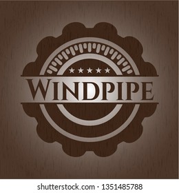 Windpipe wooden emblem