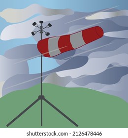 
Windsock fluttering in the wind in stormy weather