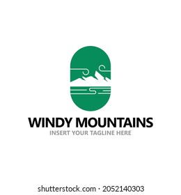 Windy mountains logo or emblem using green color tone and negative spaces.