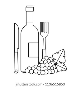 wine bottle with cutleries and grapes