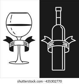Wine bottle and glass on white and black background.