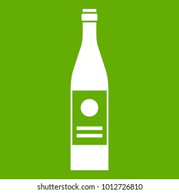 Wine bottle icon white isolated on green background. Vector illustration