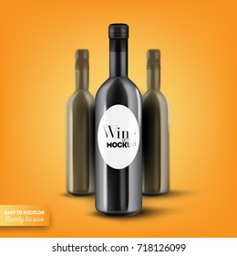 Wine bottle mockup, ready to use. Black wine bottle with shadow on bright orange background with blurred bottles behind