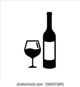 Wine bottle vector icon. Alcohol icon. Alhocol flat sign design. Wine and glass symbol pictogram