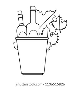 wine bottles in bucket with leafs