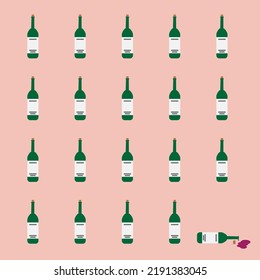 Wine bottles with one spilled bottle on pink background