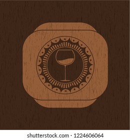 wine cup icon inside badge with wood background