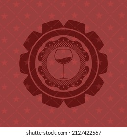 Weinbecher-Ikone innerhalb des Abzeichen mit rotem Hintergrund. 