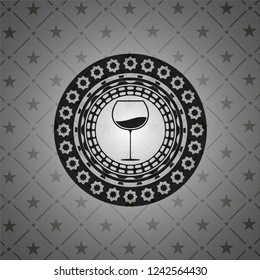 wine cup icon inside black emblem