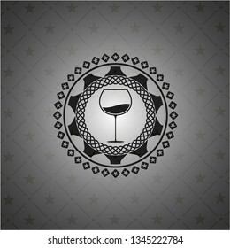wine cup icon inside black emblem