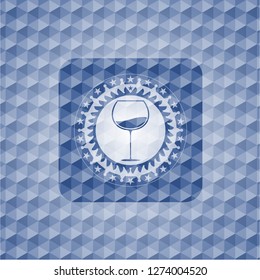 wine cup icon inside blue badge with geometric pattern.