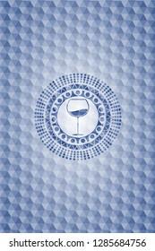 wine cup icon inside blue badge with geometric pattern background.