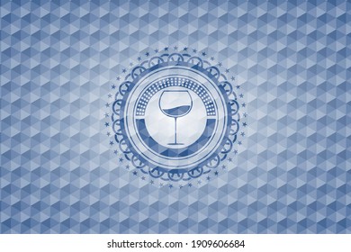 wine cup icon inside blue emblem or badge with abstract geometric pattern background. 