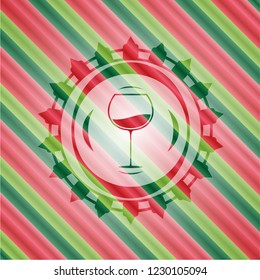 wine cup icon inside christmas emblem.