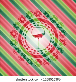 wine cup icon inside christmas badge background.