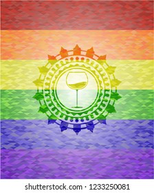 wine cup icon inside emblem on mosaic background with the colors of the LGBT flag