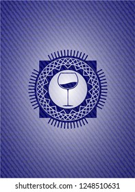wine cup icon inside emblem with jean background