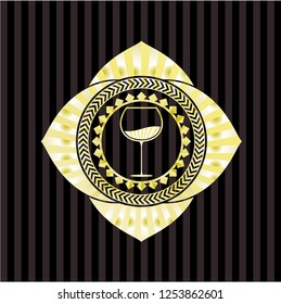 wine cup icon inside gold badge or emblem