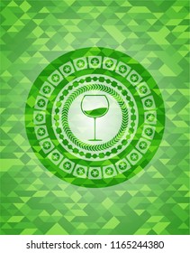 wine cup icon inside green mosaic emblem