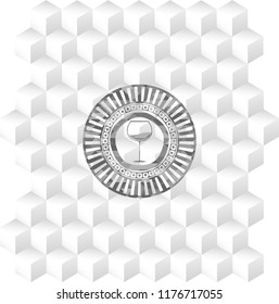 wine cup icon inside grey badge with geometric cube white background