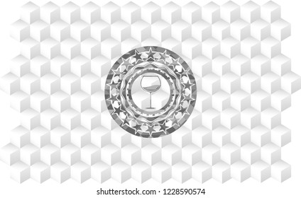 wine cup icon inside grey emblem with geometric cube white background