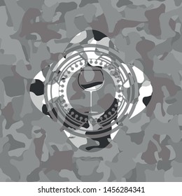 wine cup icon inside grey camo emblem
