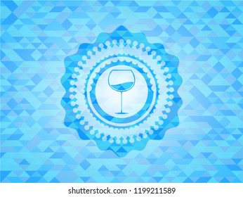 wine cup icon inside light blue emblem. Mosaic background