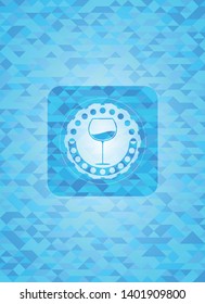 wine cup icon inside light blue emblem. Mosaic background