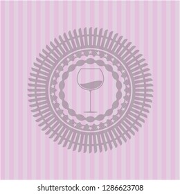 wine cup icon inside pink emblem. Retro