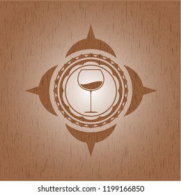 wine cup icon inside realistic wooden emblem