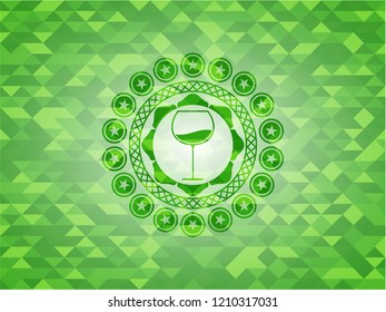 wine cup icon inside realistic green mosaic emblem