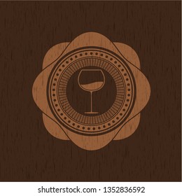 wine cup icon inside realistic wooden emblem