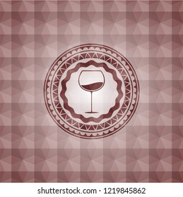 wine cup icon inside red geometric pattern emblem. Seamless.