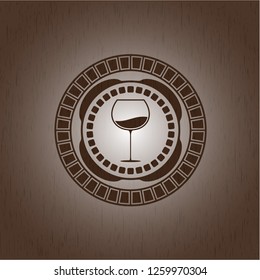 wine cup icon inside retro wooden emblem