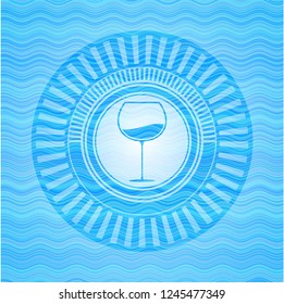 wine cup icon inside water concept style emblem.