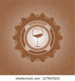 wine cup icon inside wood emblem. Vintage.