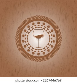wine cup icon inside wood badge or emblem. 
