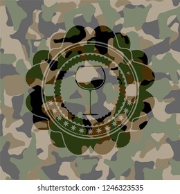 wine cup icon on camouflaged pattern