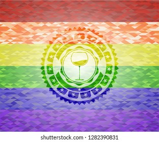 wine cup icon on mosaic background with the colors of the LGBT flag