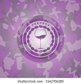 wine cup icon on pink and purple camouflaged pattern