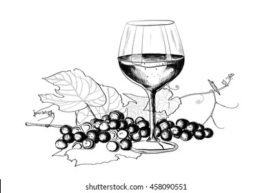 Wine glass and bunch of grapes.